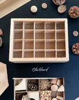 Loose parts storage box with clear perspex lid and blackboard tray